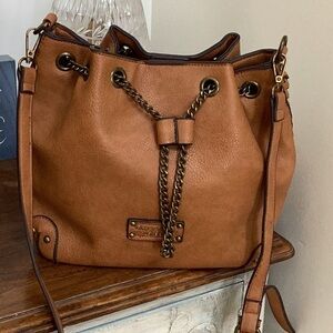 Darcy Marks London brown crossbody purse, bucket bag.